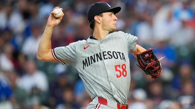 Minnesota Twins starting pitcher David Festa throws against the Chicago...