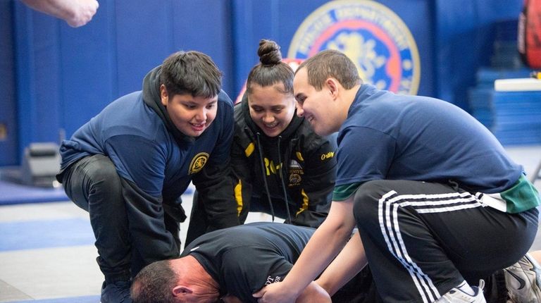 From left, Uniondale JROTC students Chris Quintanilla, 14, and Katherine...