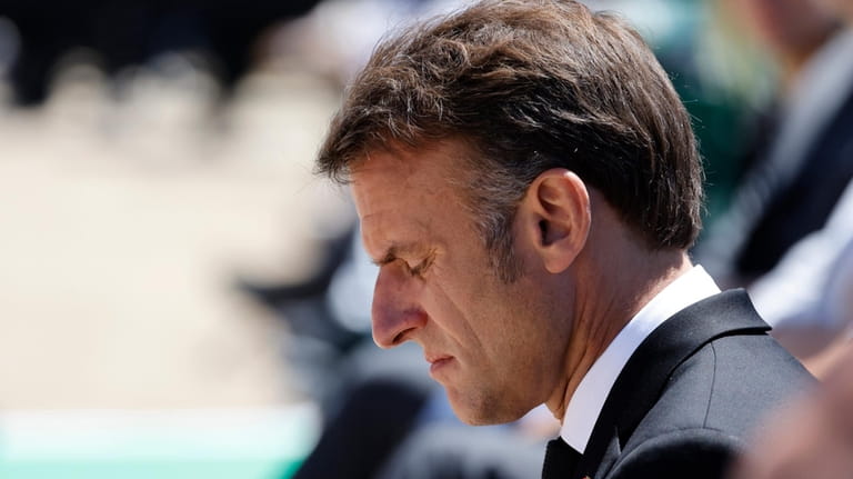 French President Emmanuel Macron attends a WWII in Oradour-sur-Glane, southwestern...