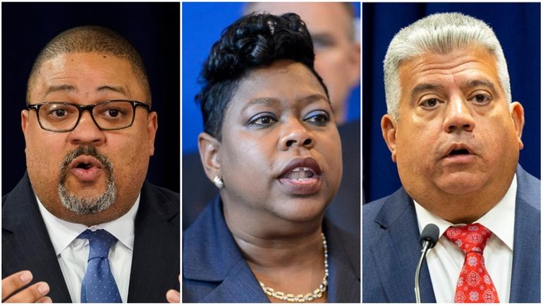 Manhattan DA  Alvin Bragg, left, Bronx DA  Darcel Clark and...