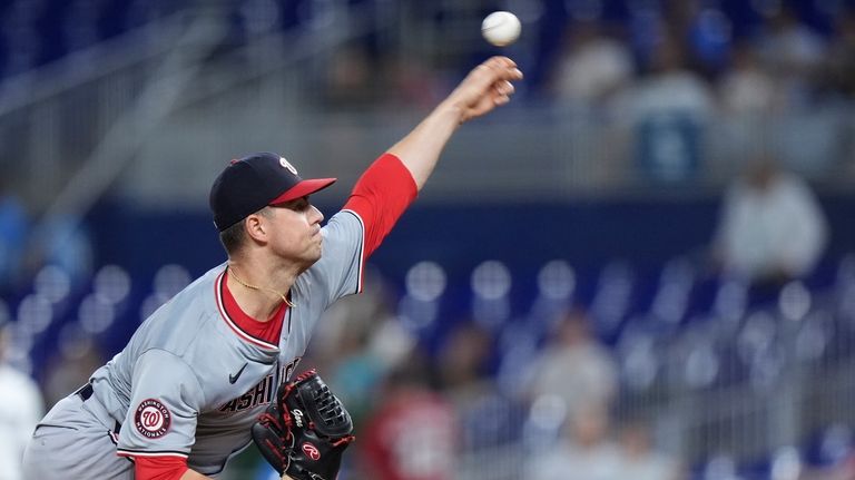 Washington Nationals' MacKenzie Gore delivers a pitch during the fifth...