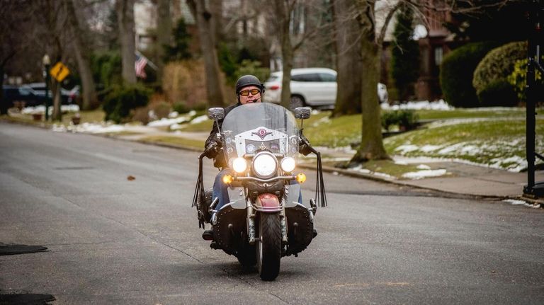 Zach Slavin leaves his Rockville Centre home on his motorcycle,...