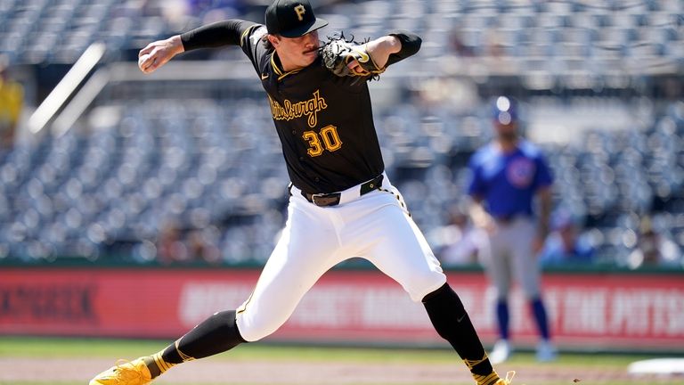 Pittsburgh Pirates starting pitcher Paul Skenes delivers during the first...