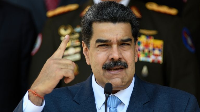 In this March 12, 2020 file photo, Venezuelan President Nicolas...