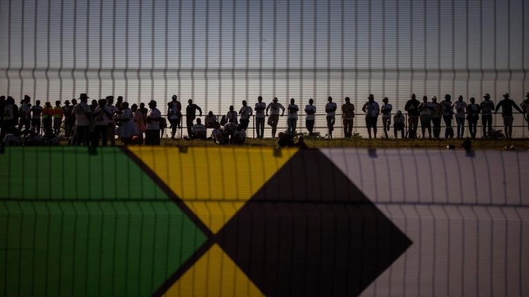 Supporters of Inkatha Freedom Party attend an election rally in...