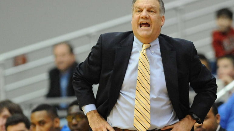 Hofstra head coach Joe Mihalich calls out instructions to his...