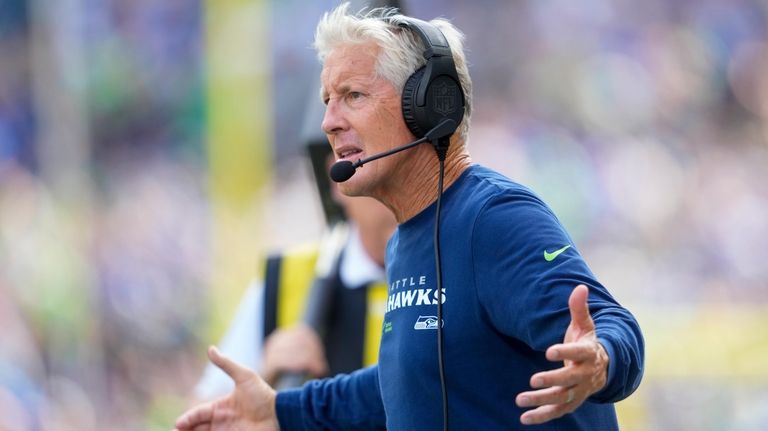 Seattle Seahawks head coach Pete Carroll reacts during the first...