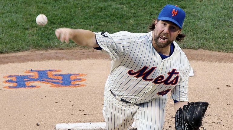 R.A. Dickey pitches in the first inning against the Philadelphia...