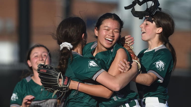 Lia Fong of Bellmore JFK, second from right, celebrates with...