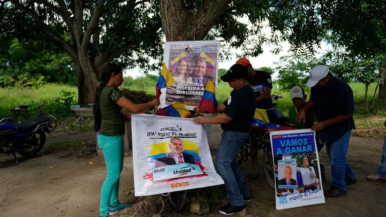 Supporters of opposition presidential candidate Edmundo Gonzalez and leader Maria...