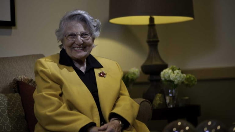 Atria resident Joan Jacobs, 90, a retired school librarian, enjoys...