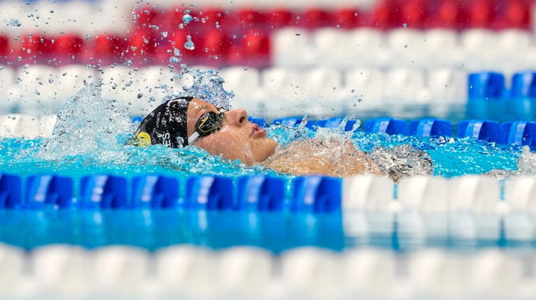 Katie Grimes swims during the Women's 400 individual medley finals...