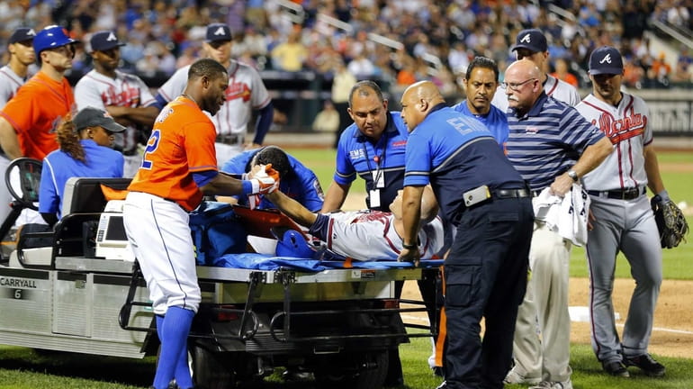 Photos: Atlanta Braves pitcher Tim Hudson ankle injury July 24