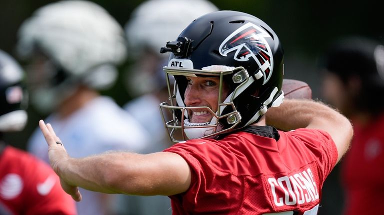 Atlanta Falcons quarterback Kirk Cousins throws a pass during an...