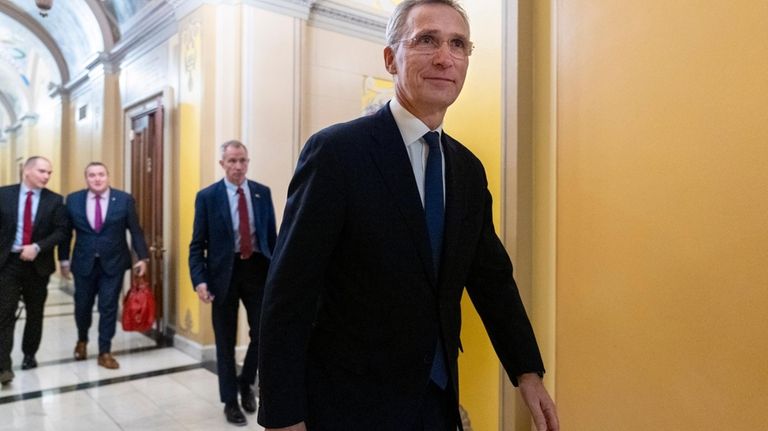 NATO Secretary General Jens Stoltenberg walks through the U.S. Capitol...