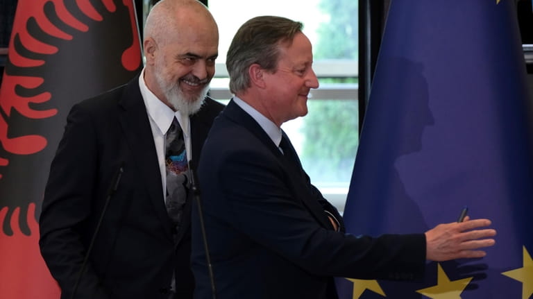 British Foreign Secretary David Cameron, right, and Albania's Prime Minister...