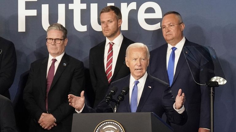 Britain's Prime Minister Keir Starmer, left, looks on as U.S....