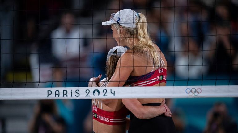 United States' Taryn Kloth and Kristen Nuss celebrate victory in...