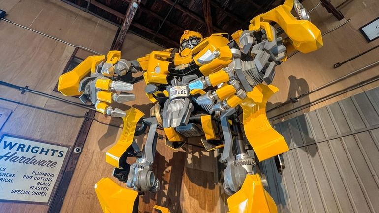 A larger-than-life Bumblebee from the "Transformers" films is on display...