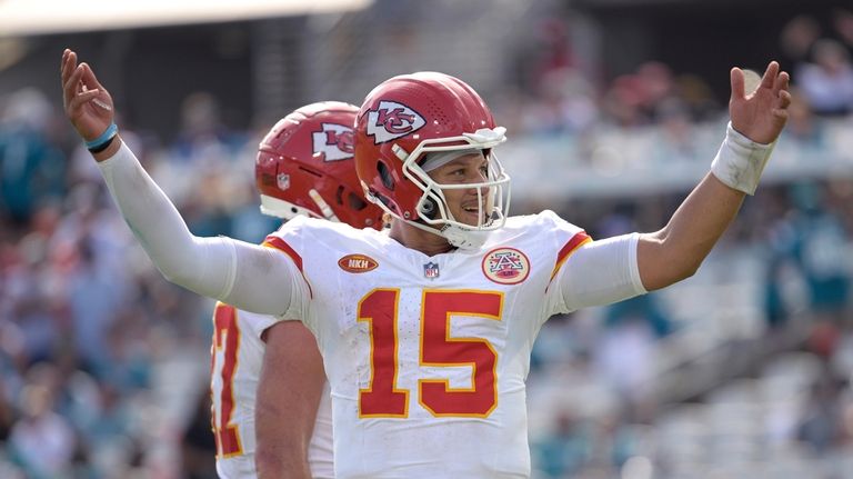 Kansas City Chiefs quarterback Patrick Mahomes (15) gestures to the...