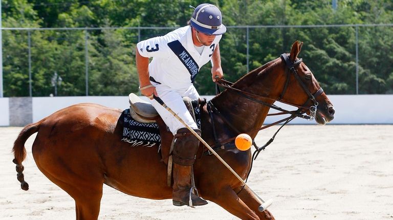 Polo player Rob Ceparano of Medford practices at Country Farms Equestrian...