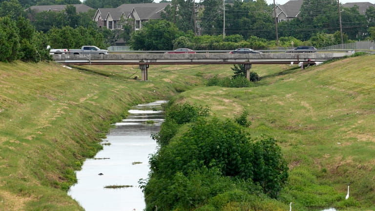 A bridge crosses the shallow creek where 12-year-old Jocelyn Nungaray's...