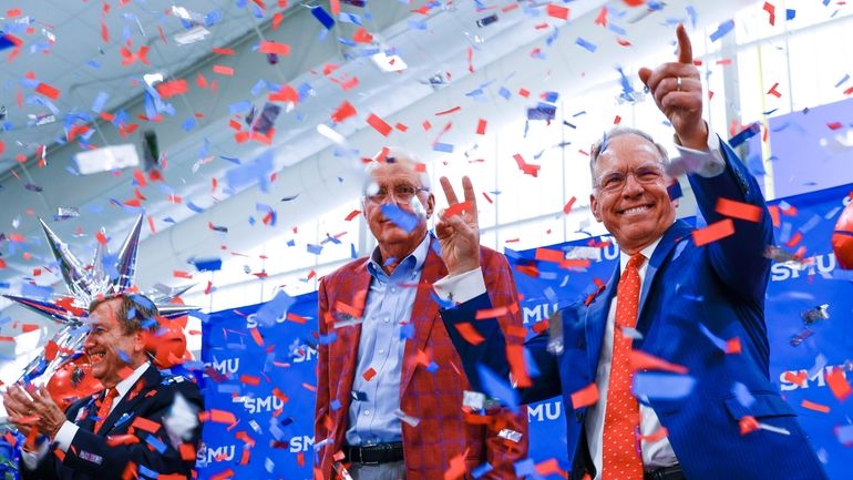 SMU President R. Gerald Turner; board chair David Miller; and...