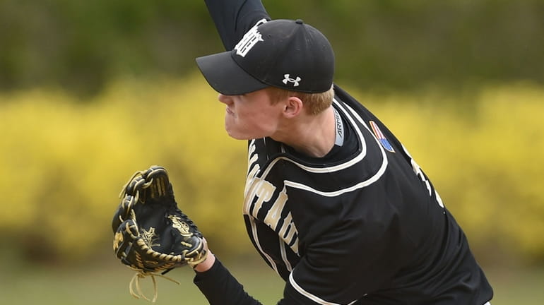 Jack Tate, Wantagh pitcher, delivers to the plate in the...