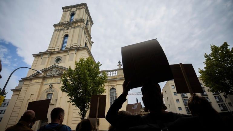 Participants in a protest by the "Citizens' Initiative for a...