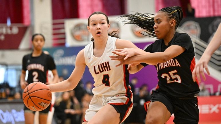 Long Island Lutheran's Kayleigh Heckel (4) moves the ball against...