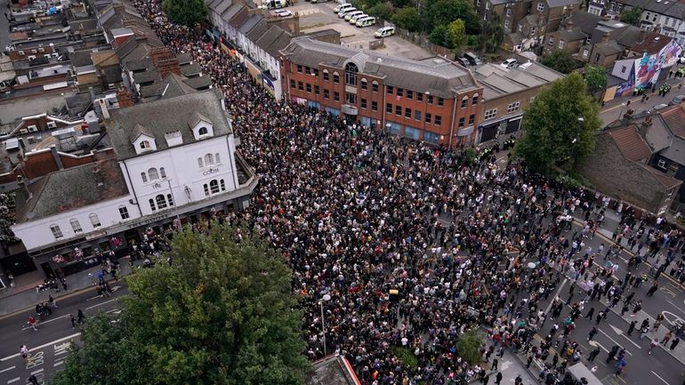 General view of people gathering to protest against a planned...