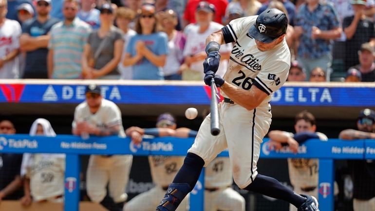 Minnesota Twins' Max Kepler hits a game-winning RBI infield single...