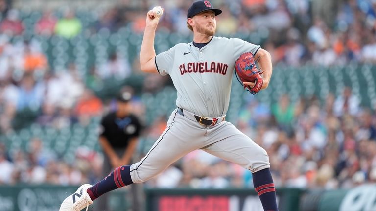 Cleveland Guardians starting pitcher Tanner Bibee throws during the first...