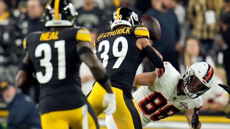 Cleveland Browns tight end Harrison Bryant (88) fumbles the football...