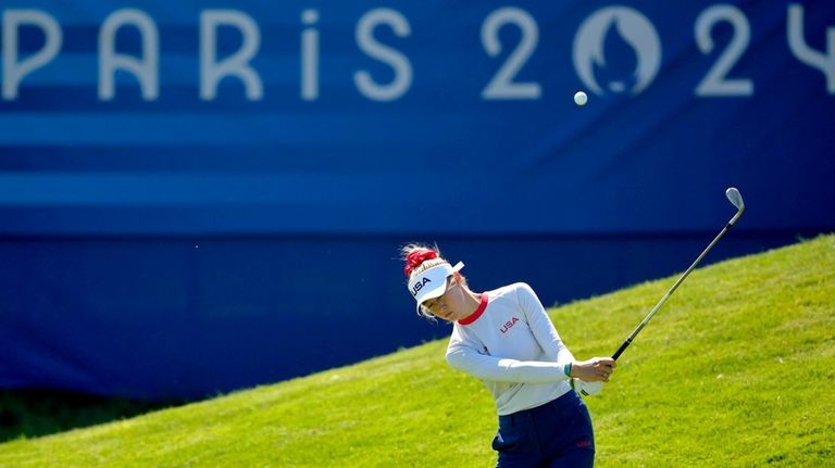 Nelly Korda, of the United States, hits on the ninth...