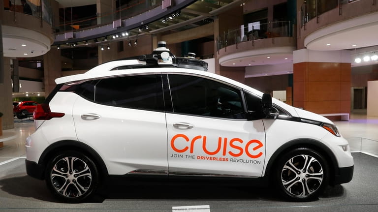 An electric car driving for Cruise, General Motor's troubled robotaxi...