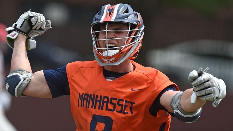 Cal Girard of Manhasset reacts after gaining control of a...