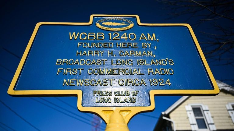 A historic plaque honoring the spot on Bedell Street, in...