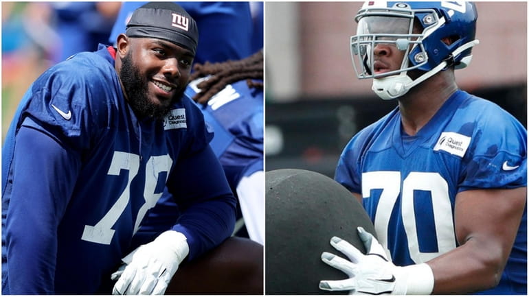 Giants offensive tackles Andrew Thomas and Evan Neal during training...