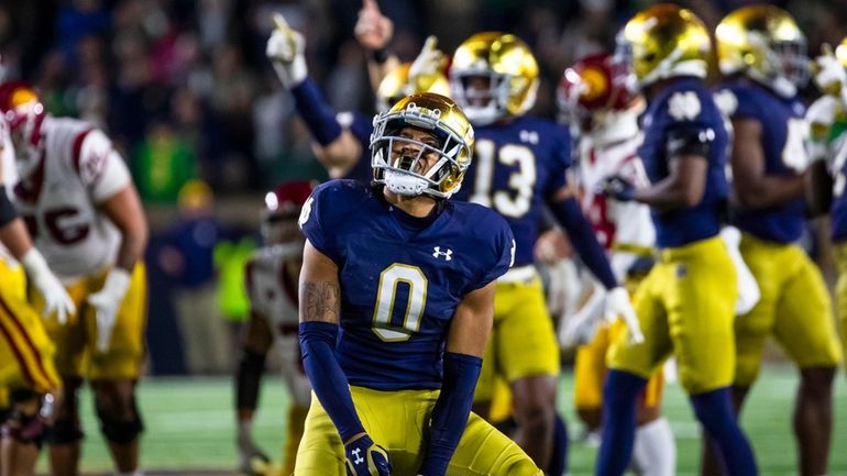 Notre Dame safety Xavier Watts (0) celebrates during the second...