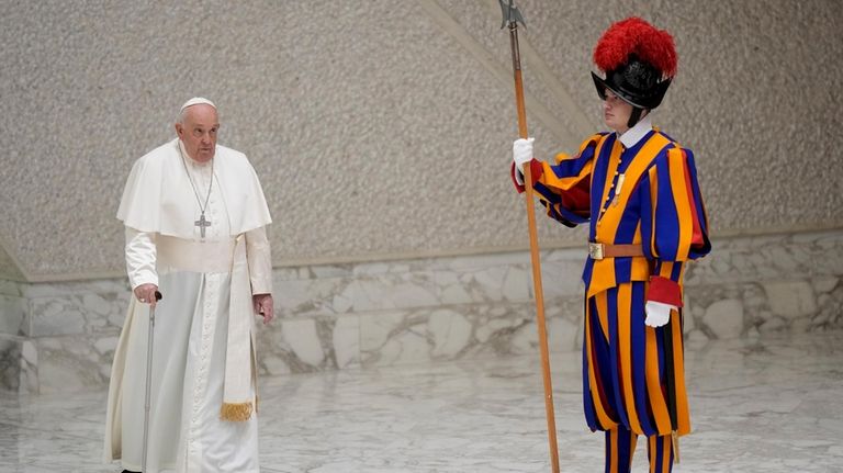 Pope Francis arrives for his weekly general audience in the...