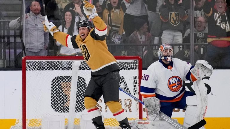 Golden Knights center Ivan Barbashev, left, celebrates after centerz Eichel...