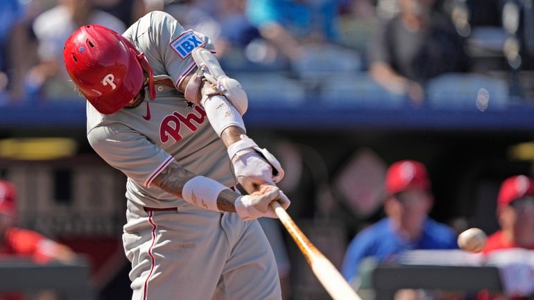 Philadelphia Phillies' Nick Castellanos hits a two-run home run during...