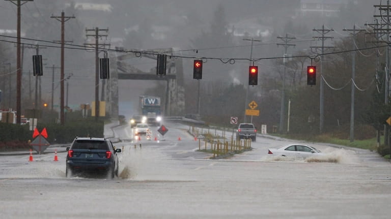Heavy rain causes high water and flooding along Highway 101...