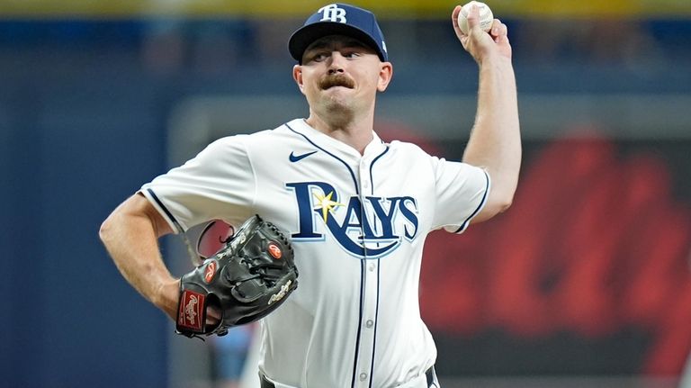 Tampa Bay Rays relief pitcher Tyler Alexander delivers to the...