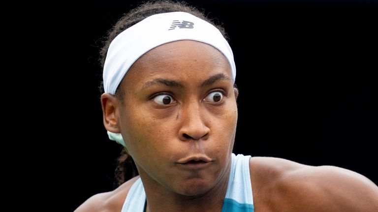 United States' Coco Gauff keeps her eyes on the ball...