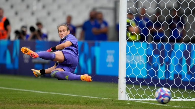 Germany goalkeeper Ann-Katrin Berger is scored during a penalty shoot-out...