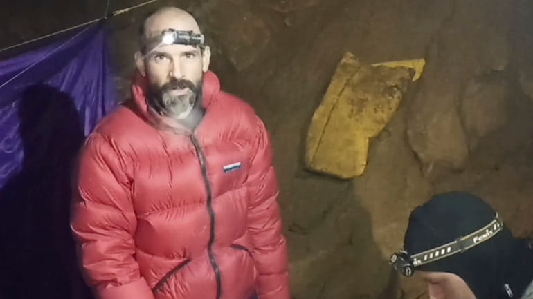 A screen grab from a video shows American caver Mark Dickey,...