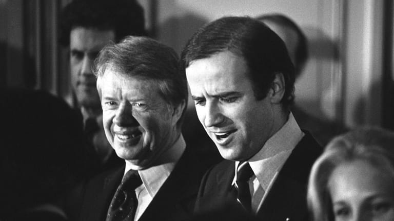 President Jimmy Carter, left, and Sen. Joseph R. Biden Jr.,...