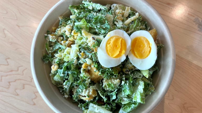 The Crispy Chicken Poblano salad with a jammy egg at...